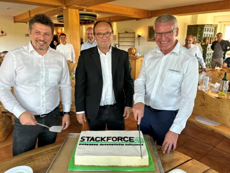 STACKFORCE management cutting the STACKFORCE cake at 10 years anniversary celebration